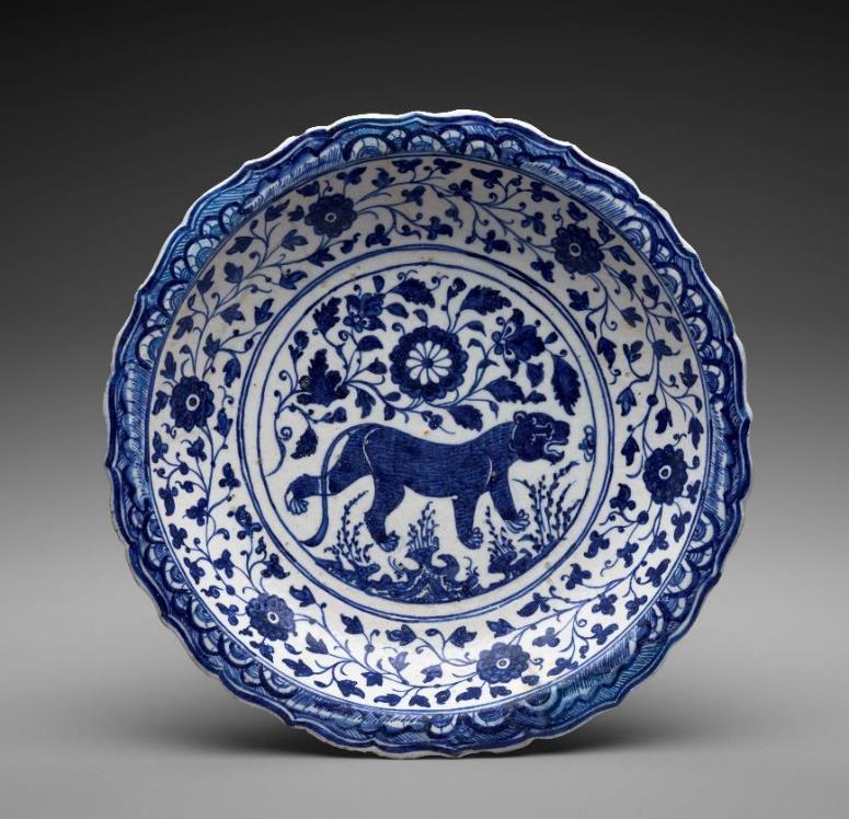 Plate with blue artwork on it